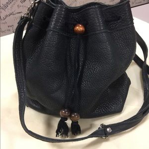 This dark green cinch leather bag
